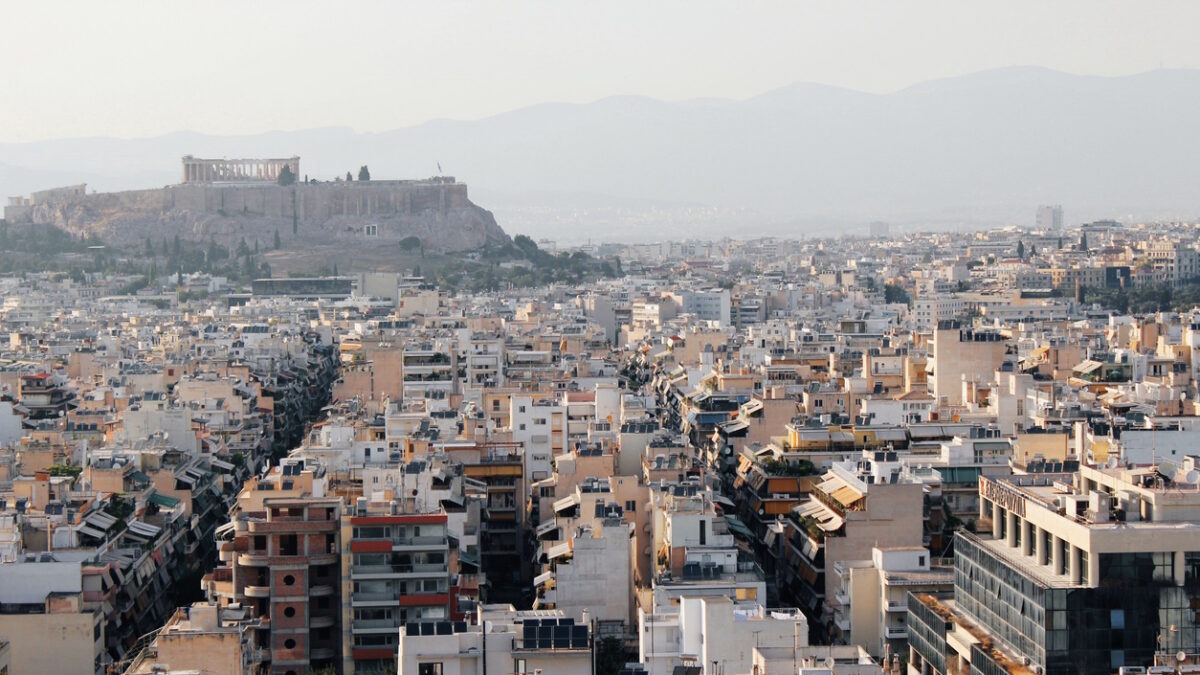 Partial view of Athens city with Acropolis hill in the background - Athens, Greece, June 13 2019.