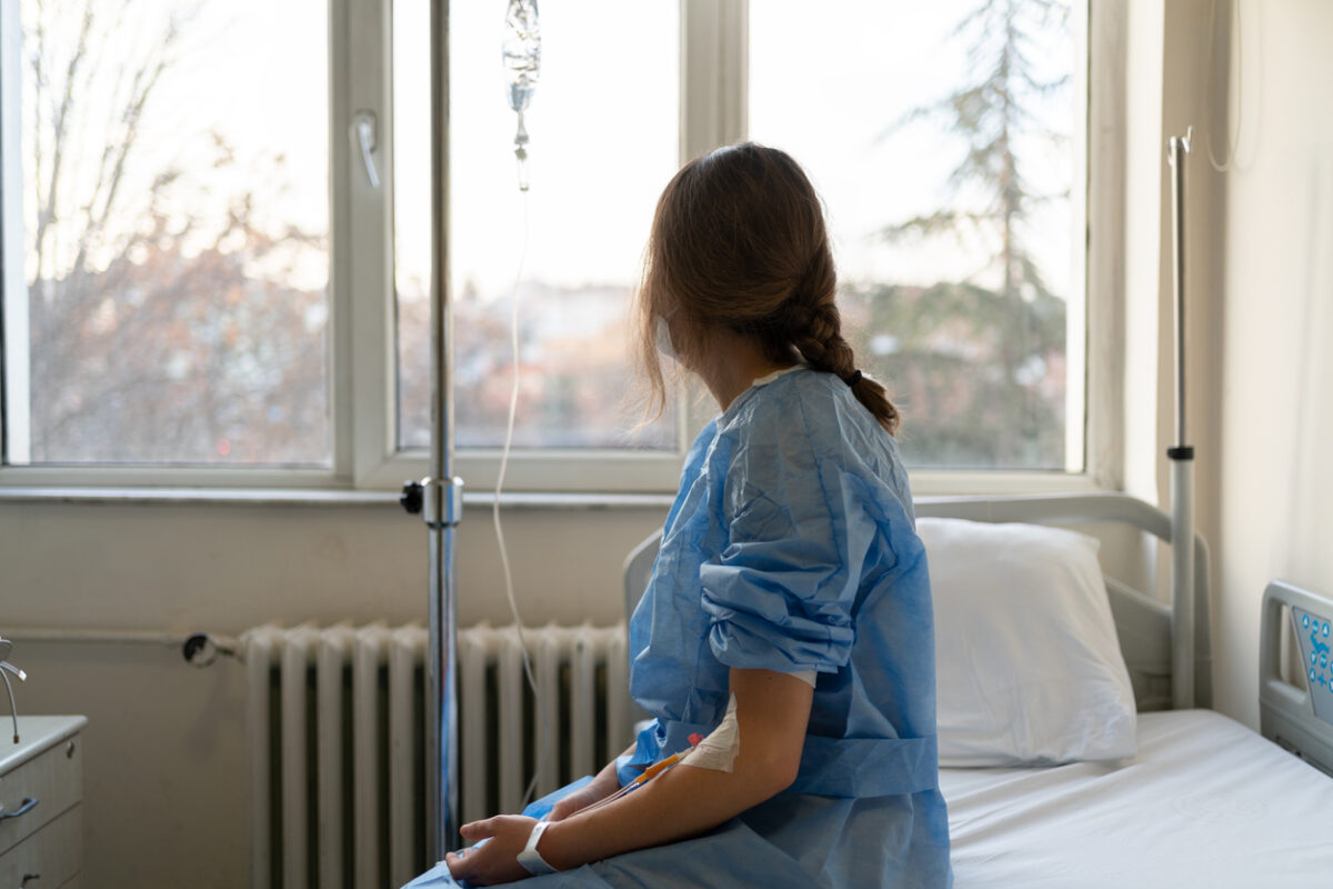 Patient Receiving Serum In Hospital Room