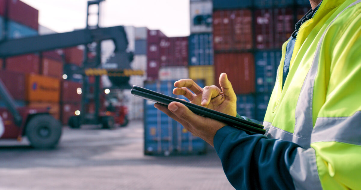 Hand, worker and tablet for shipping outdoor for cargo crane, inventory inspection and delivery safety of logistics. Person, digital and container information, transport service and distribution site