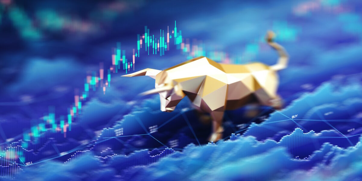 A stylized golden bull figurine stands prominently against a digital background of rising stock market charts and candlestick graphs, symbolizing bullish market trends, financial growth, and investor confidence. Ideal for illustrating economic optimism, stock trading, or market analysis