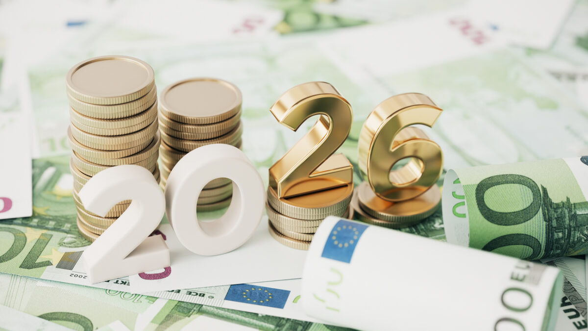 Gold Colored 2026 text and stack coin over 100 Euro Bills
