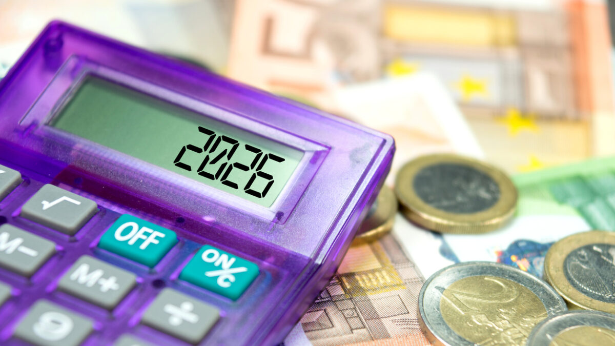 Euro banknotes, calculator and the year 2026