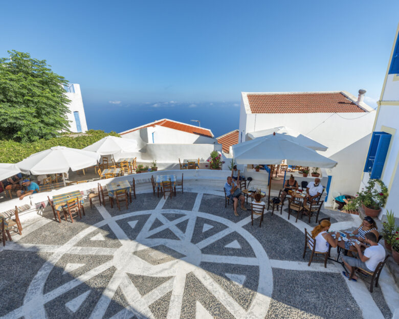 "Porta" square of Nikia village, Nisyros island, Dodecanese, Greece. This is the highest village on the volcano island Nisyros. This image is GPS tagged