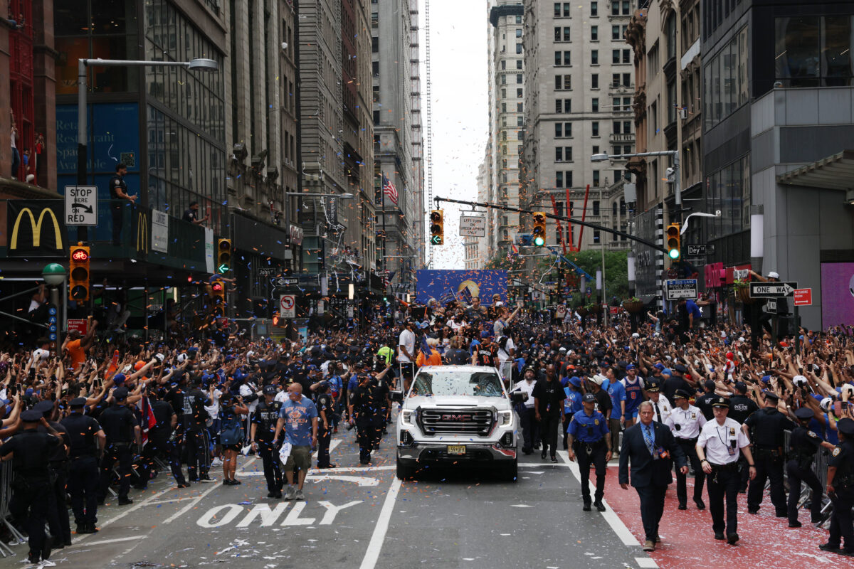 Basketball - NBA - New York Knicks Parade - New York City, New York, U.S. - June 18, 2026 New York Knicks fans celebrate as the players travel along broadway during the parade REUTERS