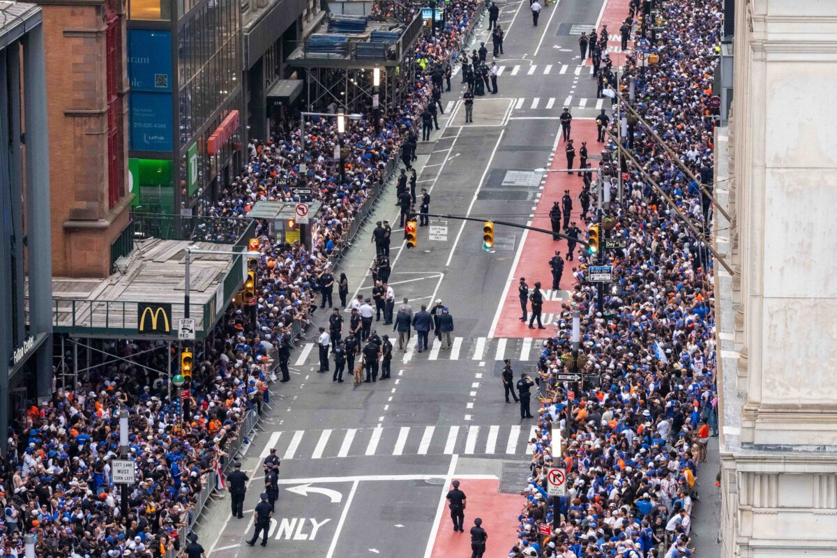 NEW YORK, NEW YORK - JUNE 18: Thousands of fans line Broadway in lower Manhattan for the New York Knicks Championship ticker tape parade and victory rally celebrating winning the 2026 NBA Finals on June 18, 2026 in New York City. The New York Knicks defeated the San Antonio Spurs in five games to win their first NBA Championship in 53 years. (Photo by Adam Gray