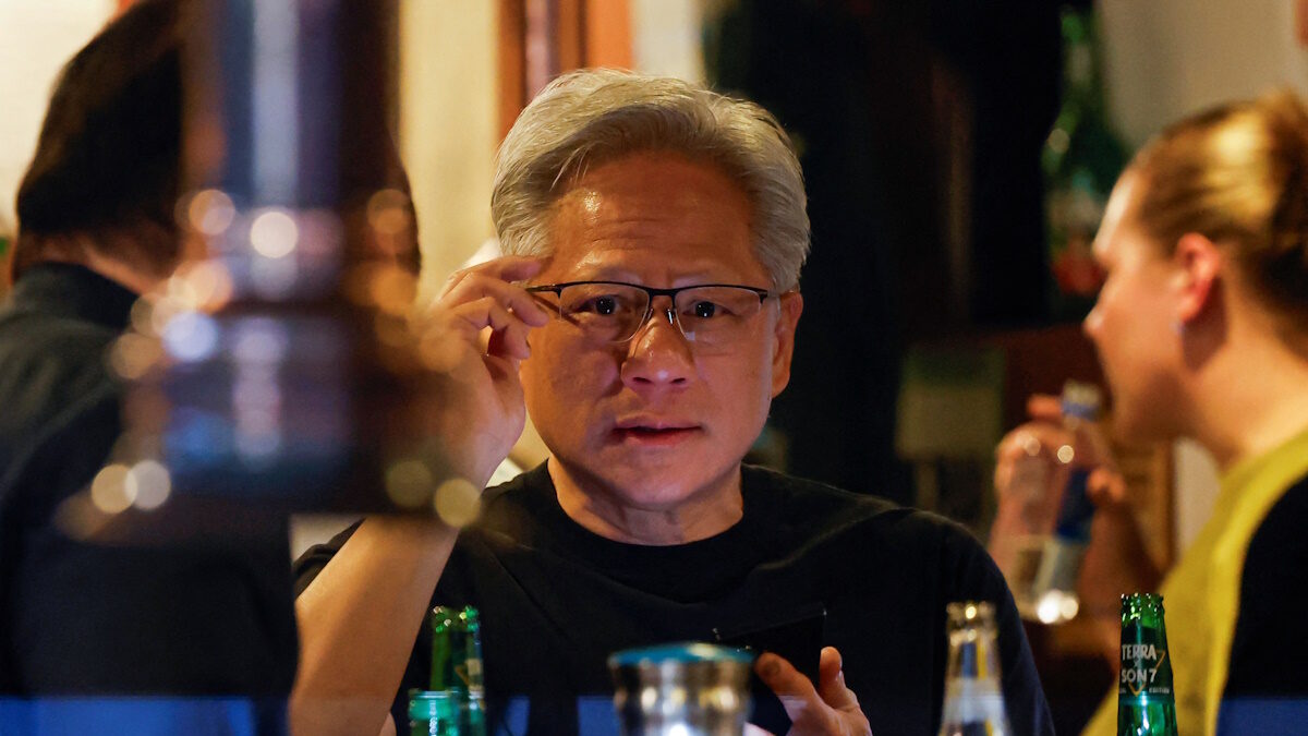 Nvidia CEO Jensen Huang adjusts glasses during a dinner meeting with SK Group Chairman Chey Tae-won, LG Corporation Chairman and CEO Koo Kwang-mo and Naver Corporation Founder Lee Hae-jin, at a Korean barbecue restaurant in Seoul, South Korea, June 5, 2026. REUTERS/Kim Soo-hyeon