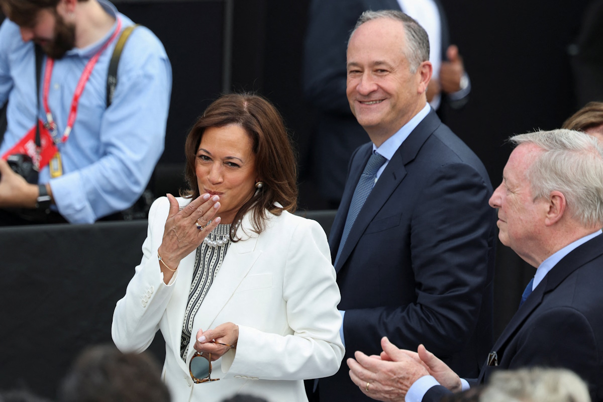 Former U.S. Vice President Kamala Harris and her husband Doug Emhoff attend a dedication ceremony for the opening of the Obama Presidential Center, in Chicago, Illinois, U.S., June 18, 2026. REUTERS
