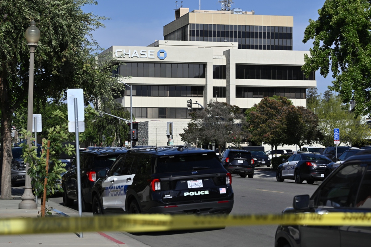 Law enforcement respond after a man barricaded himself inside a bank Tuesday, June 2, 2026, in Bakersfield, Calif.