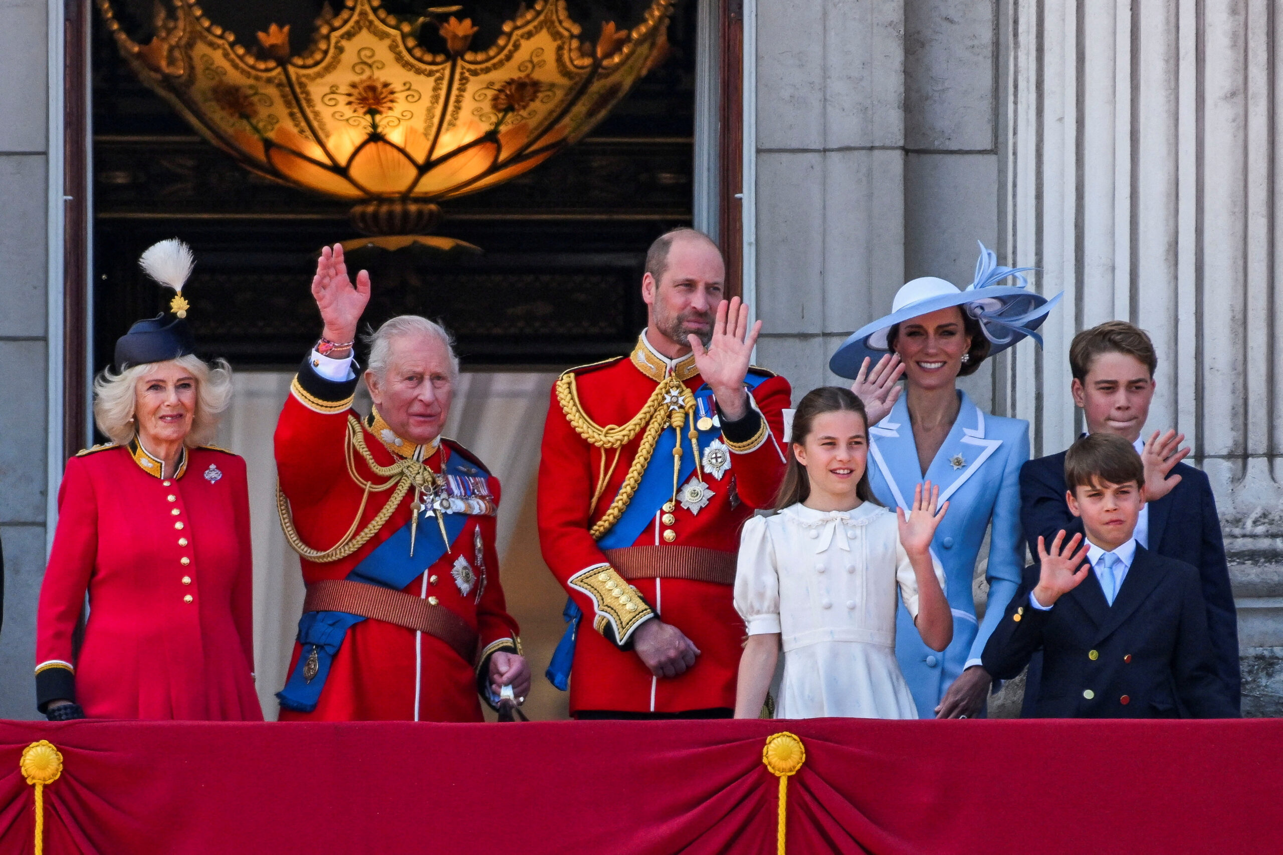 Britain's King Charles, Queen Camilla, Prince William, Kate, Princess of Wales, Prince George, Princess Charlotte and Prince Louis appear on the balcony of Buckingham Palace during the Trooping the Colour parade to honour Britain's King Charles, as part of the official birthday celebrations, in London, Britain, June 13, 2026. REUTERS/Chris J. Ratcliffe TPX IMAGES OF THE DAY