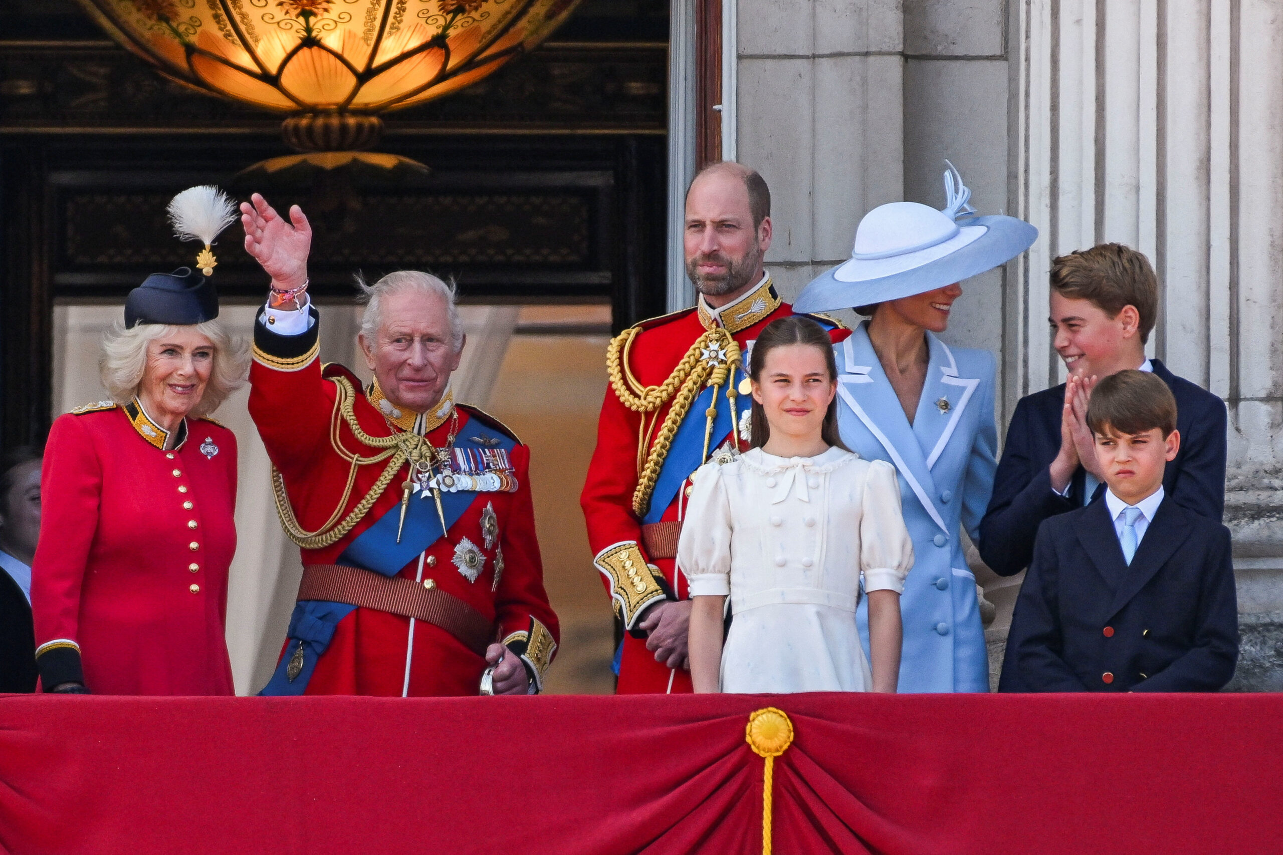 Britain's King Charles, Queen Camilla, Prince William, Kate, Princess of Wales, Prince George, Princess Charlotte and Prince Louis appear on the balcony of Buckingham Palace during the Trooping the Colour parade to honour Britain's King Charles, as part of the official birthday celebrations, in London, Britain, June 13, 2026. REUTERS/Chris J. Ratcliffe