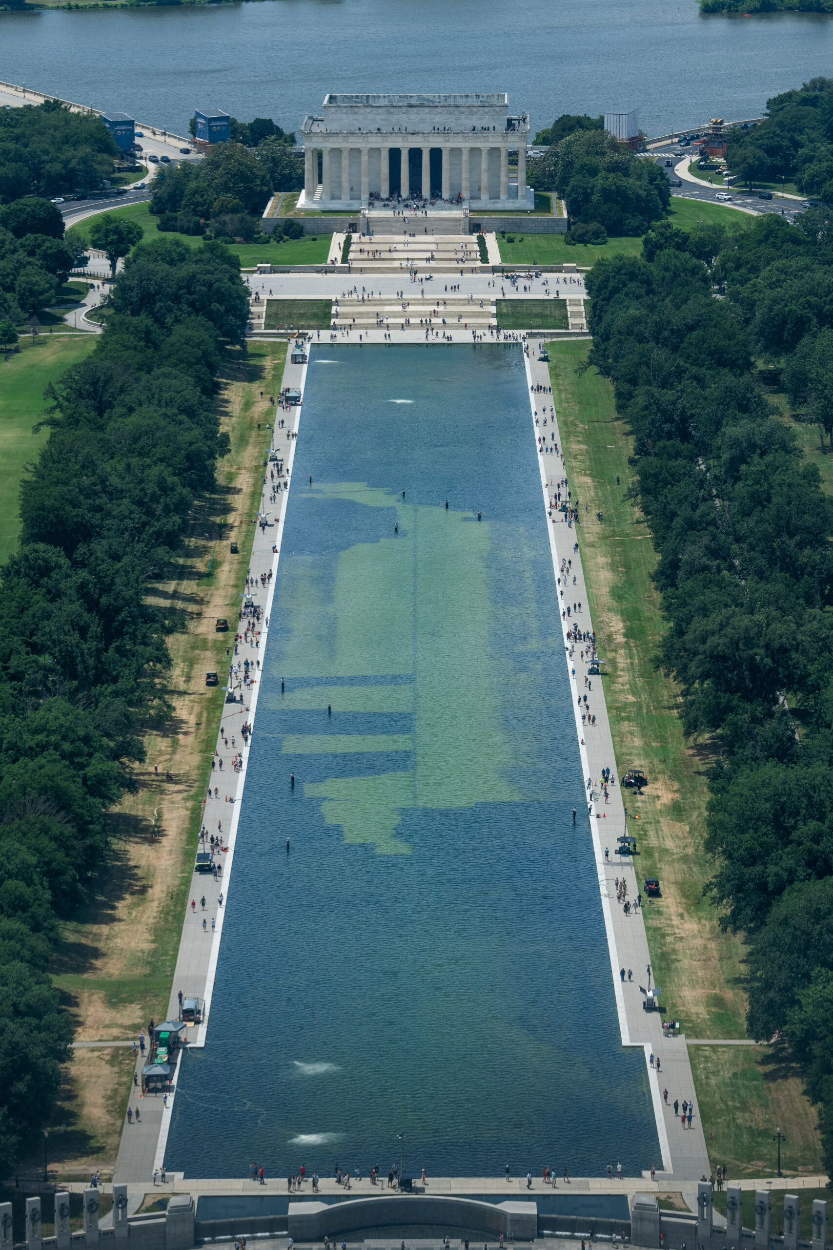 FILE PHOTO: Aerial view from the Washington Monument, crews remove algae from the bottom of the Lincoln Memorial Reflecting Pool after recent renovations following a directive from U.S. President Donald Trump to paint it blue ahead of the 250th anniversary of U.S. independence, in Washington, D.C., U.S., June 19, 2026. REUTERS/Aaron Schwartz/File Photo