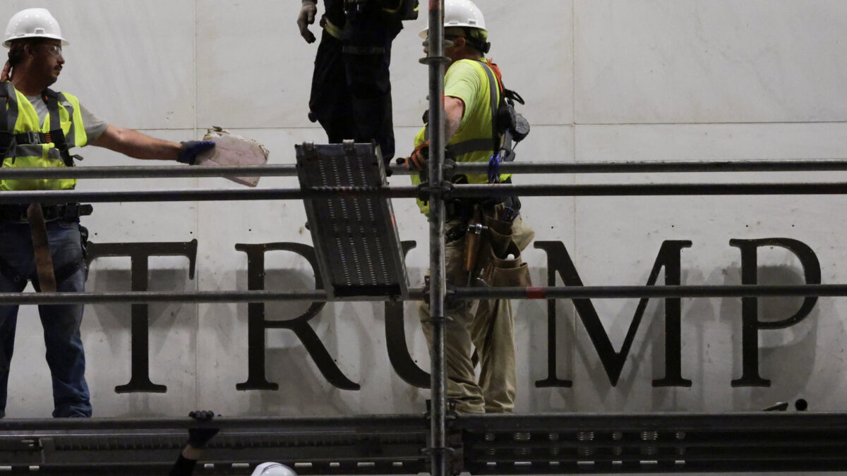 Workers prepare scaffolding ahead of removing lettering from the facade of the John F. Kennedy Memorial Center for the Performing Arts, following a federal judge’s order to remove U.S. President Donald Trump's name from the institution, in Washington, D.C., U.S., June 13, 2026. REUTERS/Jonathan Ernst