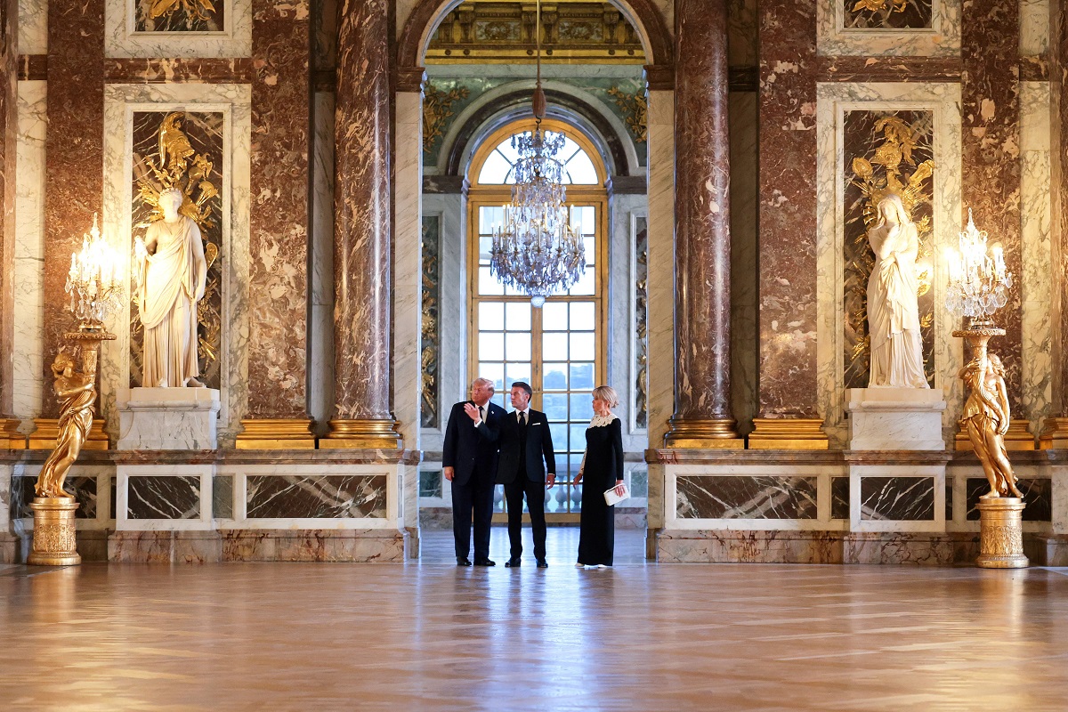 U.S. President Donald Trump receives a tour of Chateau de Versailles from President of France Emmanuel Macron and his wife Brigitte Macron ahead of a dinner, France, June 17, 2026. Anna Moneymaker