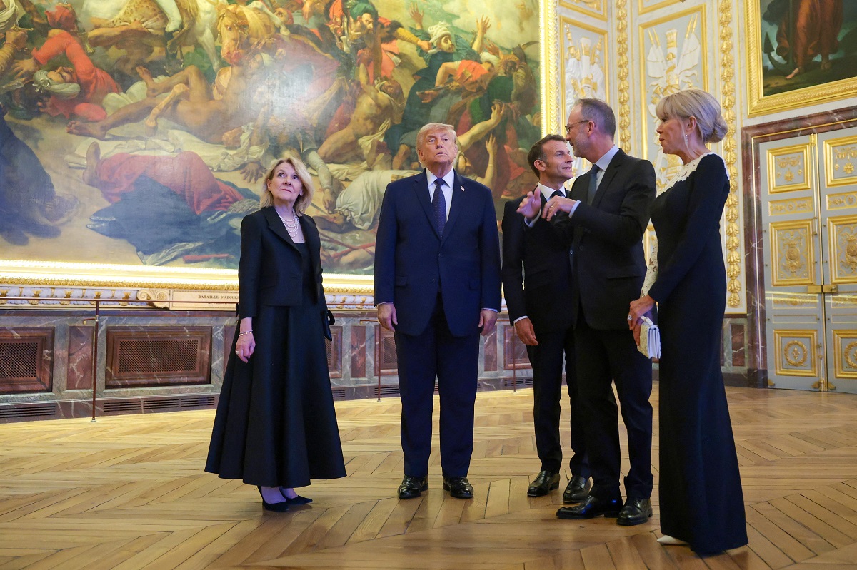 Minister of Culture Catherine Pegard, U.S. President Donald Trump, President of France Emmanuel Macron, Laurent Salome, and Brigitte Macron take a tour of Chateau de Versailles ahead of a dinner, France, June 17, 2026. Anna Moneymaker