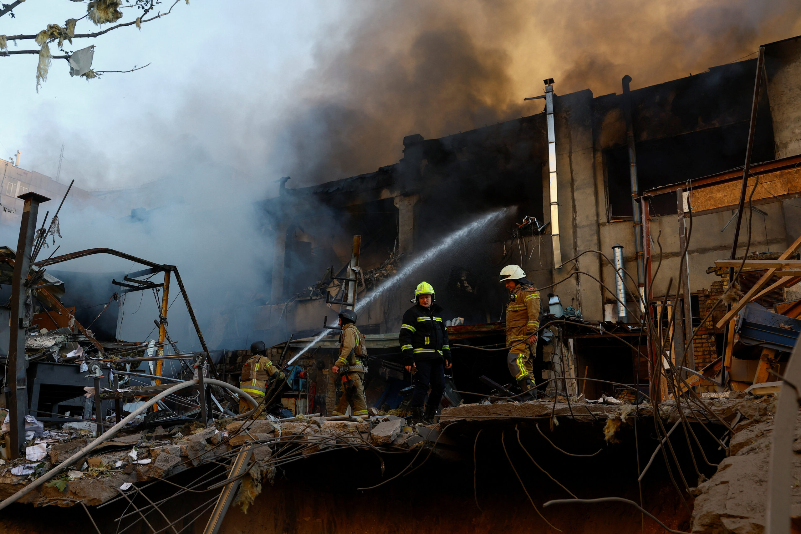 Firefighters work at the site of a car repair workshop damaged during Russian missile and drone strikes, amid Russia's attack on Ukraine, in Kyiv, Ukraine June 2, 2026. REUTERS/Valentyn Ogirenko