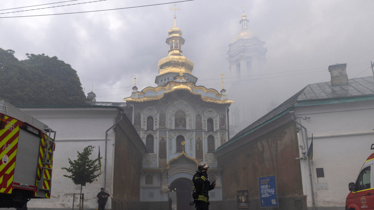 An emergency worker walks in front of Kyiv Pechersk Lavra, after it was hit during Russian missile and drone strikes, amid Russia's attack on Ukraine, in Kyiv, Ukraine June 15, 2026. REUTERS/Thomas Peter