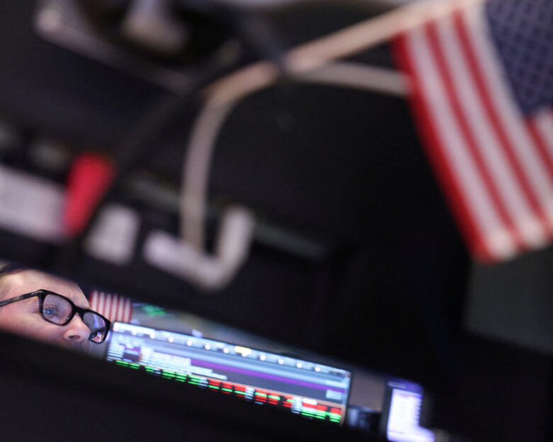 FILE PHOTO: A trader works at the New York Stock Exchange in New York City, U.S., November 6, 2024. REUTERS/Andrew Kelly/File Photo