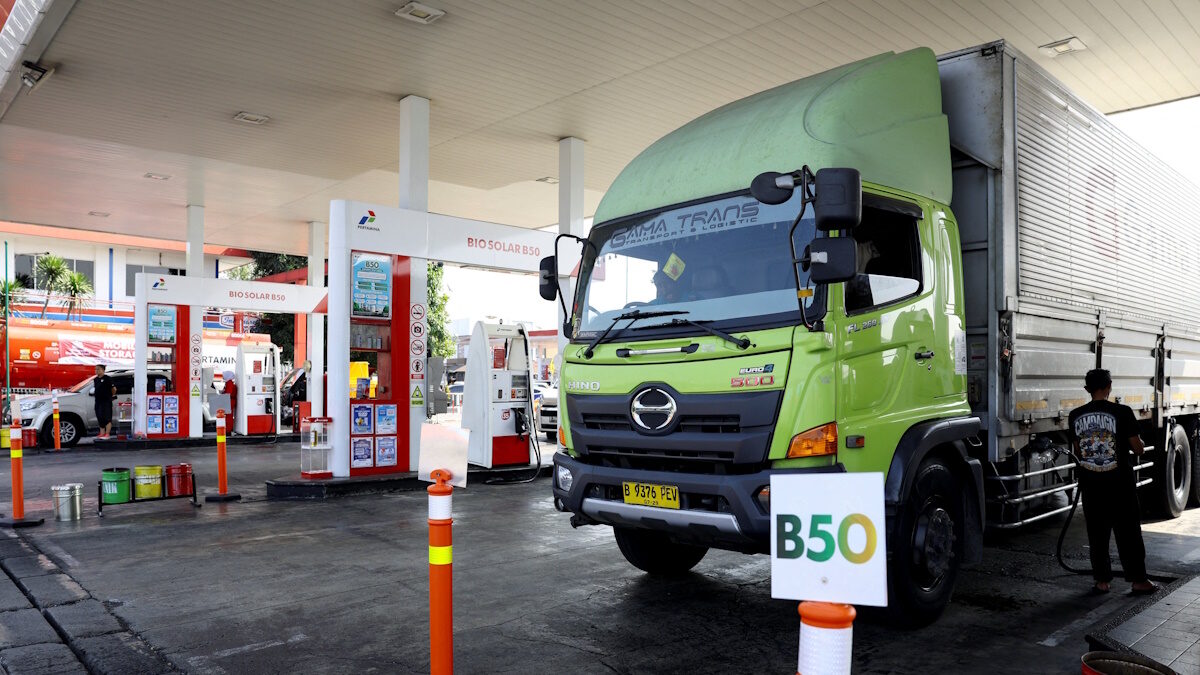 A driver refuels a truck with biodiesel containing 50% diesel fuel made of palm oil at a petrol station in Karawang, in West Java province, Indonesia, July 9, 2026.