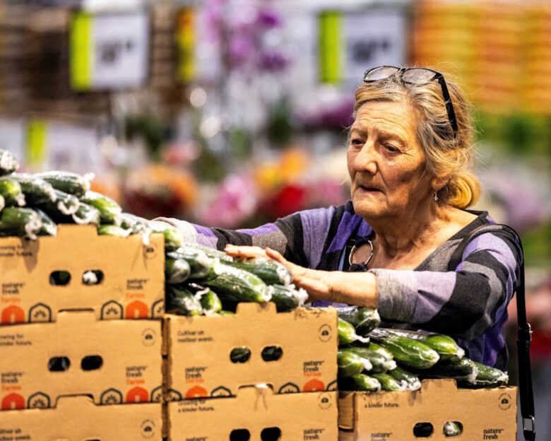 FILE PHOTO: A woman browses the produce section in Chalo FreshCo grocery store in Brampton, Ontario, Canada, June 5, 2026.