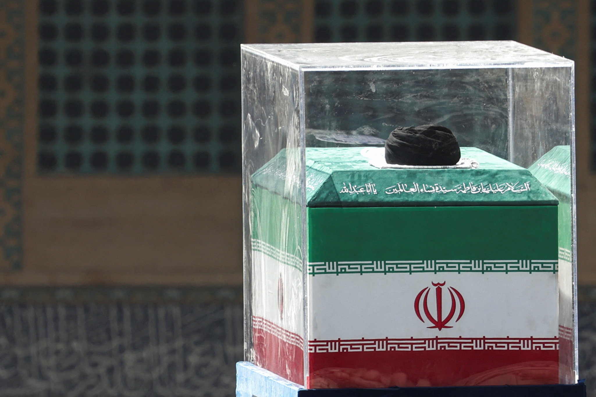 A turban is placed over the coffin of Iran's late Supreme Leader Ayatollah Ali Khamenei on stage, as people gather for a public farewell ceremony to pay their respects to late Supreme Leader Ayatollah Ali Khamenei, who was killed on February 28 in Israeli and U.S. airstrikes, at the Imam Khomeini Grand Mosalla, in Tehran, Iran July 5, 2026. REUTERS