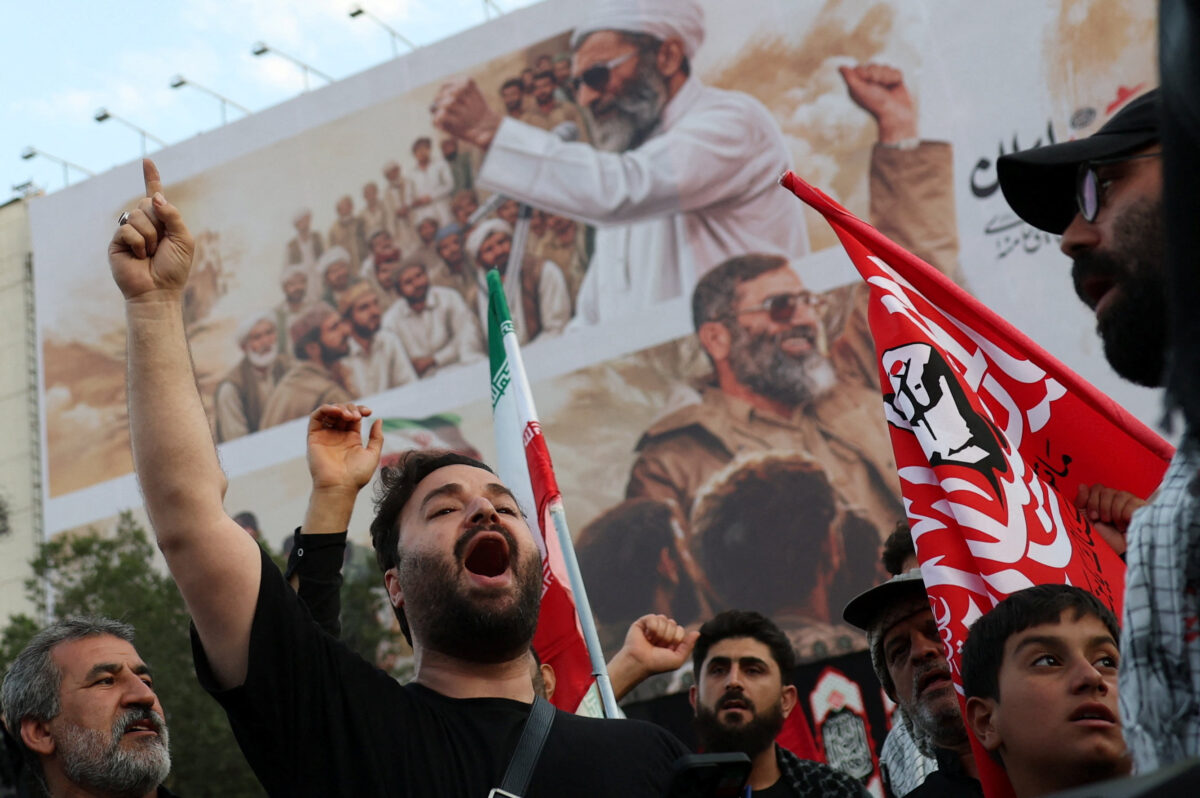 Mourners shout slogans on the day of a funeral procession for Iran's late Supreme Leader Ayatollah Ali Khamenei, who was killed on February 28 in Israeli and U.S. airstrikes, in Tehran, Iran, July 6, 2026. REUTERS
