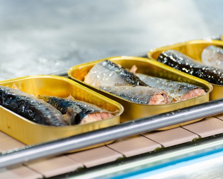 Fish laid in cans. Production of canned fish