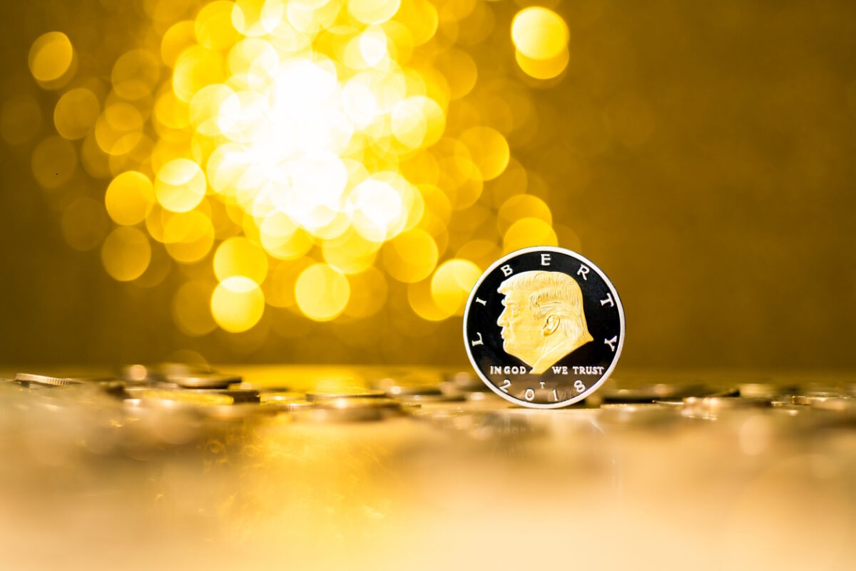 Fujian, China - December 28, 2021: Coin with Donald Trump on shiny background.Donald Trump is the 45th president of the United States