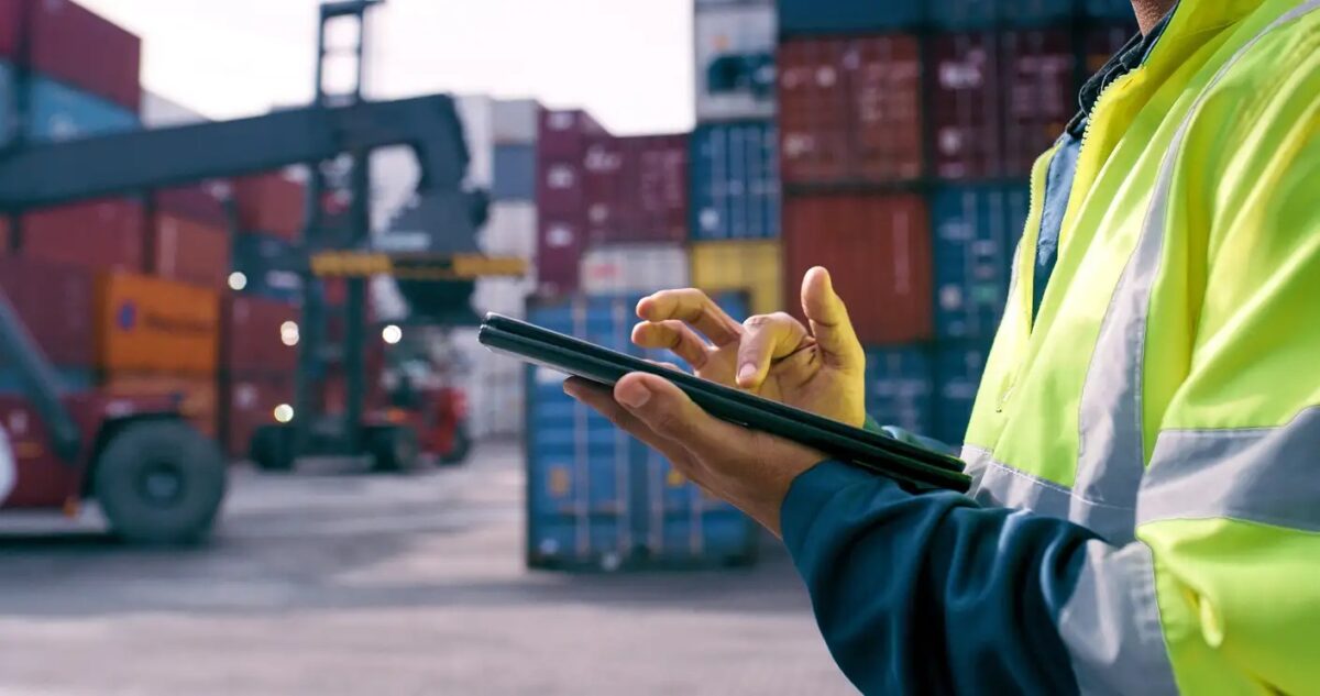 Hand, worker and tablet for shipping outdoor for cargo crane, inventory inspection and delivery safety of logistics. Person, digital and container information, transport service and distribution site