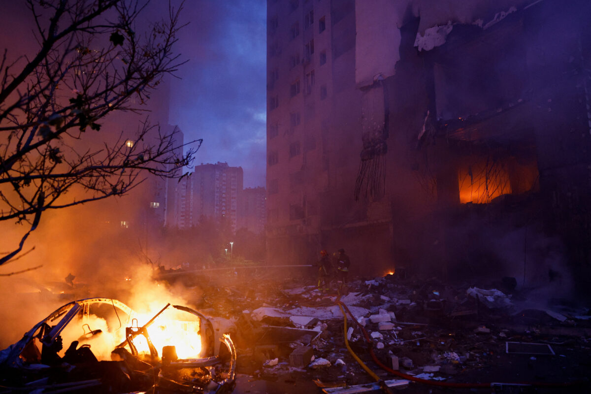 Firefighters work at the site of an apartment building, which was heavily damaged during Russian missile and drone strikes, amid Russia's attack on Ukraine, in Kyiv, Ukraine, July 6, 2026. REUTERS