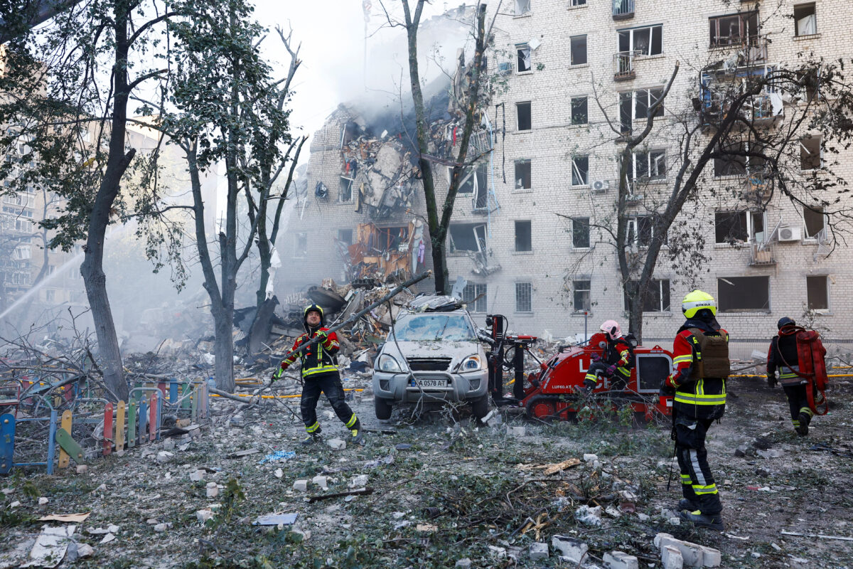 Rescuers work at the site of an apartment building damaged during overnight Russian missile and drone strikes, amid Russia’s attack on Ukraine, in Kyiv, Ukraine, July 2, 2026. REUTERS