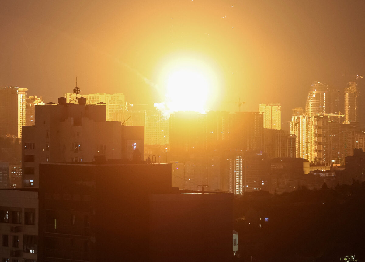 An explosion lights up the sky over the city during a Russian missile and drone strike, amid Russia's attack on Ukraine, in Kyiv, Ukraine July 6, 2026. REUTERS