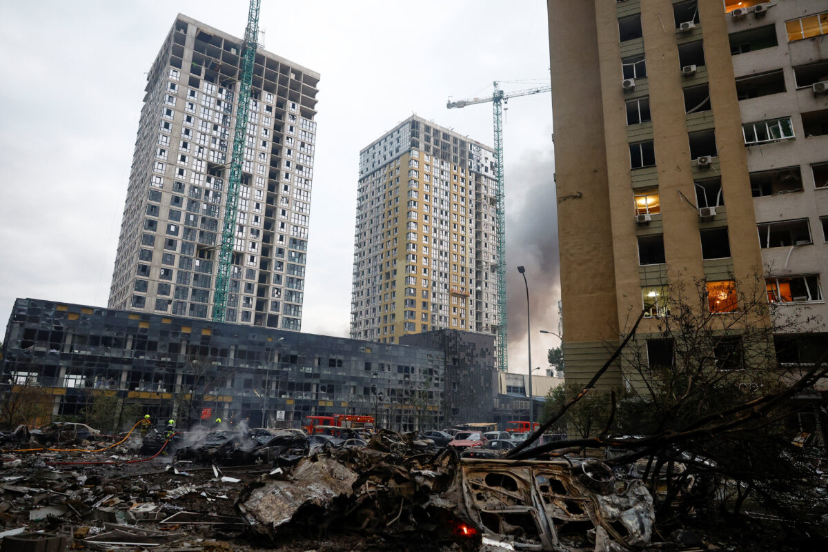 Firefighters work at the site of an apartment building, which was heavily damaged during Russian missile and drone strikes, amid Russia's attack on Ukraine, in Kyiv, Ukraine, July 6, 2026. REUTERS
