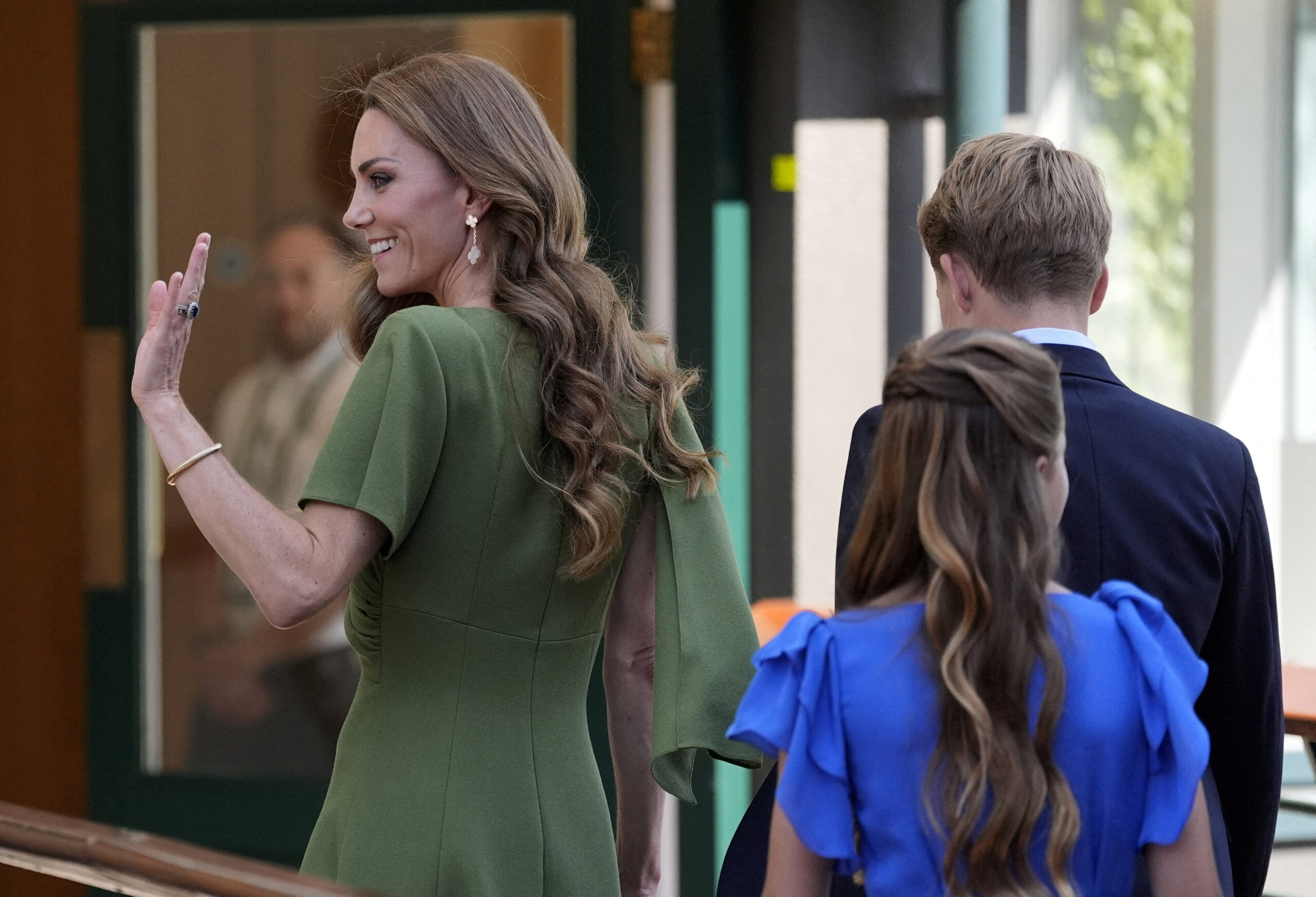 Britain's Catherine, Princess of Wales, Prince George and Princess Charlotte arrive for the 2026 Wimbledon Championships at the All England Lawn Tennis and Croquet Club, in London, Britain, July 12, 2026.    Andrew Matthews/Pool via REUTERS  Editorial use only. No commercial use without prior written consent of the AELTC. Still image use only - no moving images to emulate broadcast. No superimposing or removal of sponsor/ad logos.