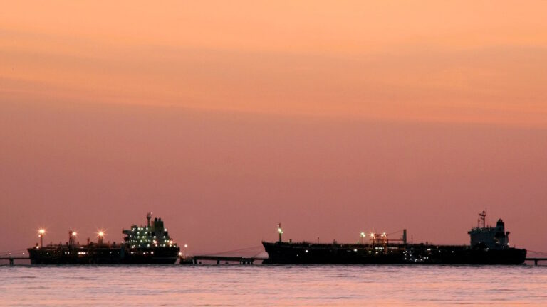 FILE PHOTO: Oil tankers are seen at daybreak at the Bajo Grande Terminal located on the western shore of Lake Maracaibo, south of the city of Maracaibo, Venezuela August 23, 2005.