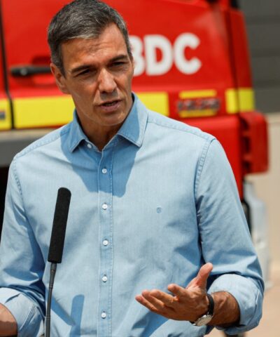 Spanish Prime Minister Pedro Sanchez speaks to the media during a visit to an area affected by a wildfire in La Vall d'Uixo, Castellon province, Spain, July 27, 2026. REUTERS/Eva Manez