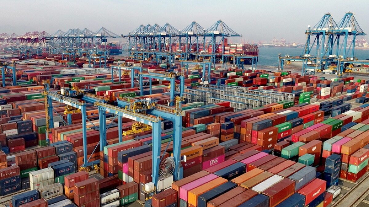 epa08867889 A view of a busy container port in Qingdao, Shandong province, China, 01 December 2020 (issued 07 December 2020). China's exports in November jumped by 21.1 percent by US dollar value from a year earlier, with exports to the United States rose 46 percent to make a record 75.4 billion US dollar trade surplus with the US. EPA/ZHANG JINGANG CHINA OUT