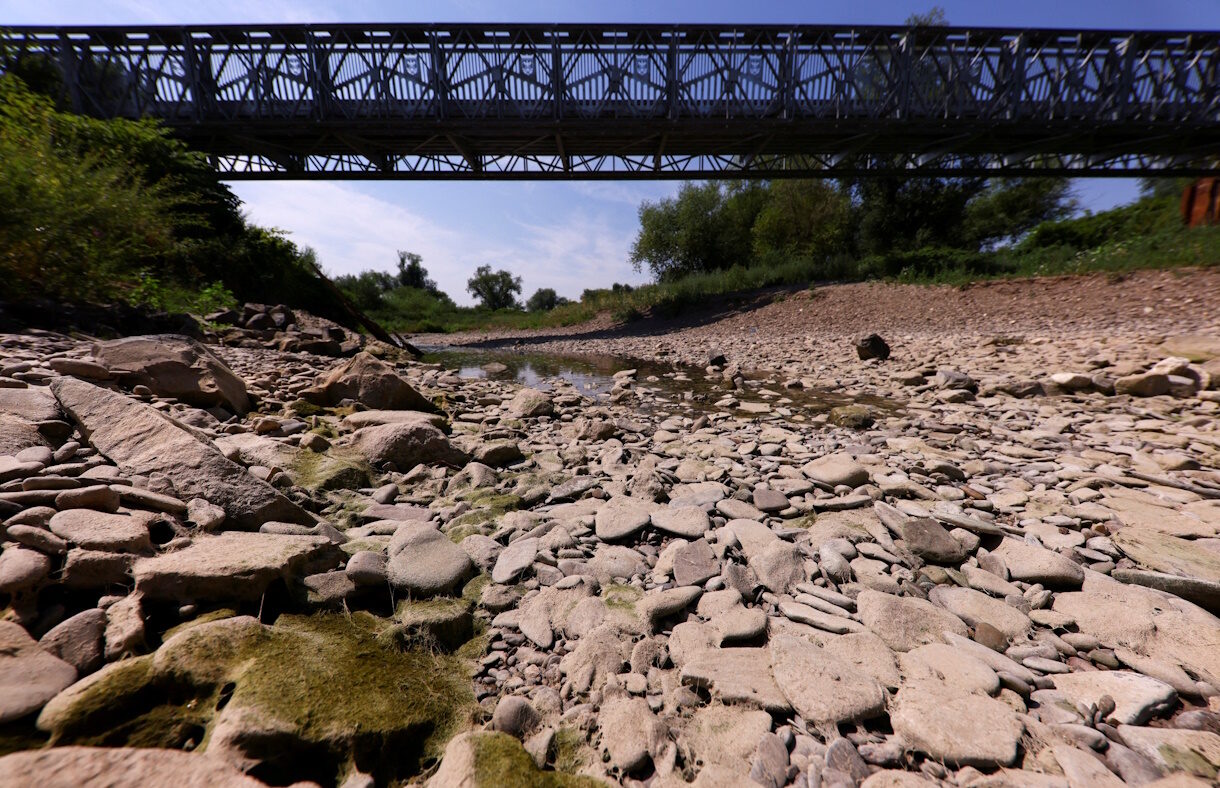FILE PHOTO: The partially dried-out riverbed of the Ahr river, at its confluence with the Rhine river, in Sinzig, Germany.