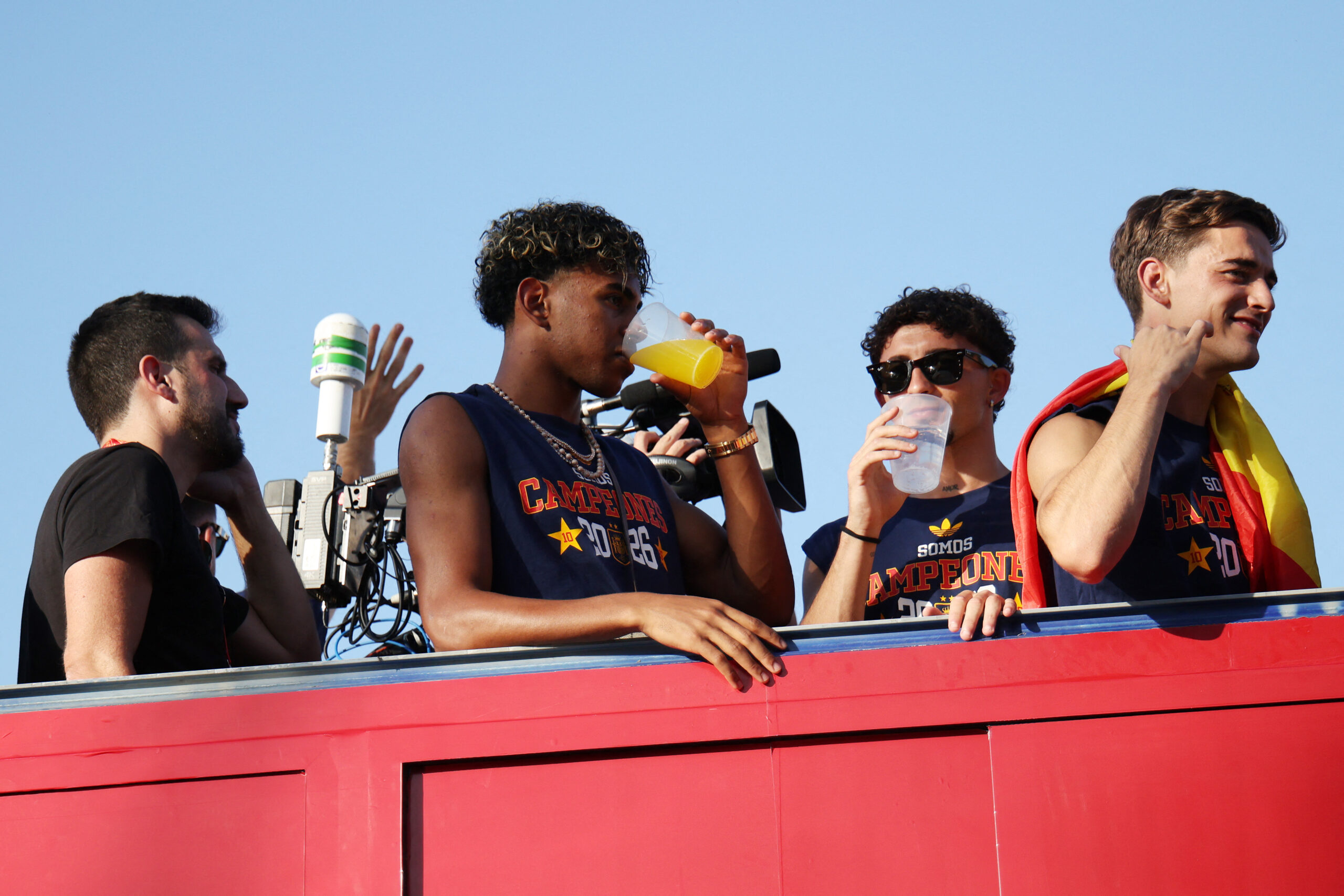 Soccer Football - FIFA World Cup 2026 - Spain Victory Parade - Madrid, Spain - July 20, 2026 Spain's Lamine Yamal and teammates celebrate winning the World Cup during the victory parade REUTERS
