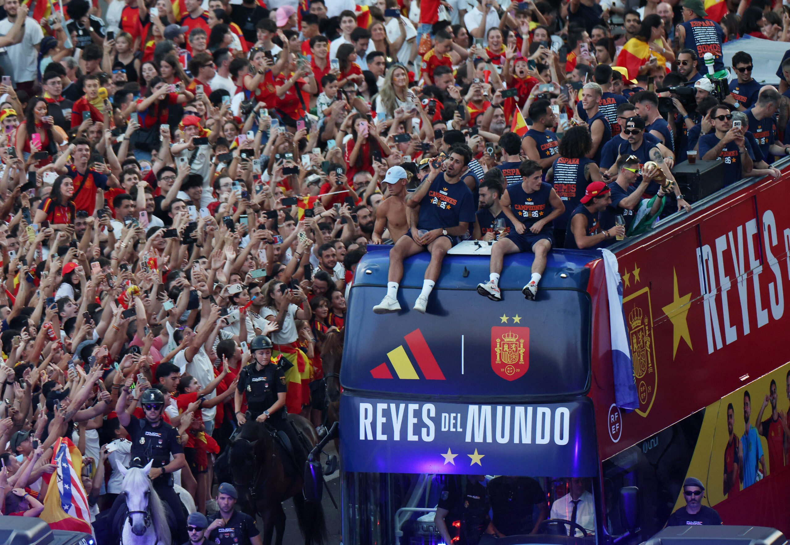 Soccer Football - FIFA World Cup 2026 - Spain Victory Parade - Madrid, Spain - July 20, 2026 Spain's Rodri, Gavi and teammates celebrate after winning the World Cup during the victory parade REUTERS