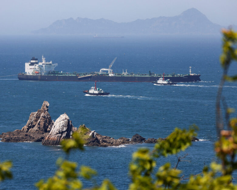 Tugboats guide the crude oil tanker Odessa, carrying UAE crude after passing through the Strait of Hormuz with its Automatic Identification System transponder turned off, navigates the waters at Daesan port, where it is expected to discharge crude oil, in Seosan, South Korea, May 8, 2026. REUTERS/Kim Soo-hyeon TPX IMAGES OF THE DAY