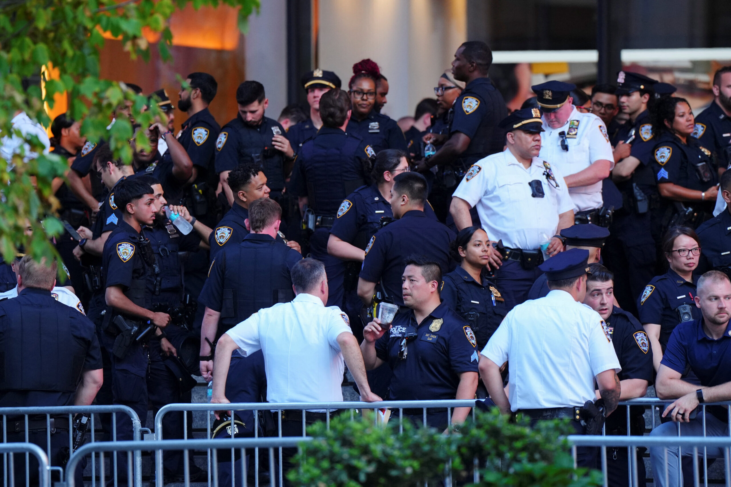 New York City Police Department officers stand outside Madison Square Garden, the venue for the wedding celebrations of singer Taylor Swift and National Football League (NFL) player Travis Kelce, in New York, U.S., July 3, 2026. REUTERS
