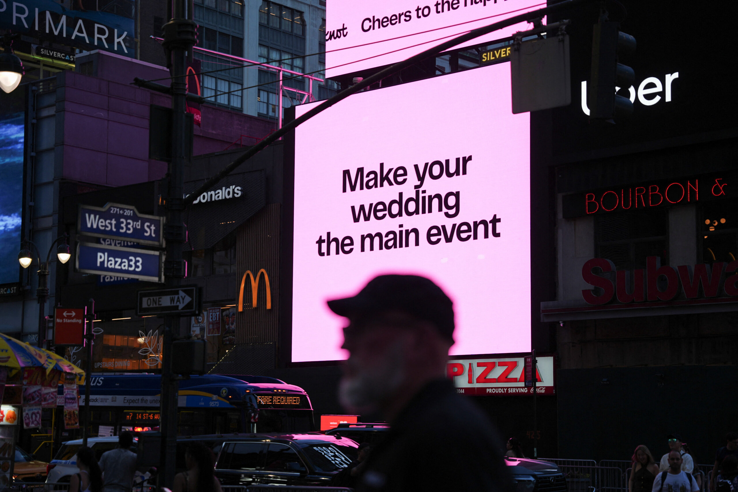 A screen displays a message referencing singer Taylor Swift and National Football League (NFL) player Travis Kelce near Madison Square Garden, the venue for their reported wedding celebrations, in New York, U.S., July 3, 2026. REUTERS