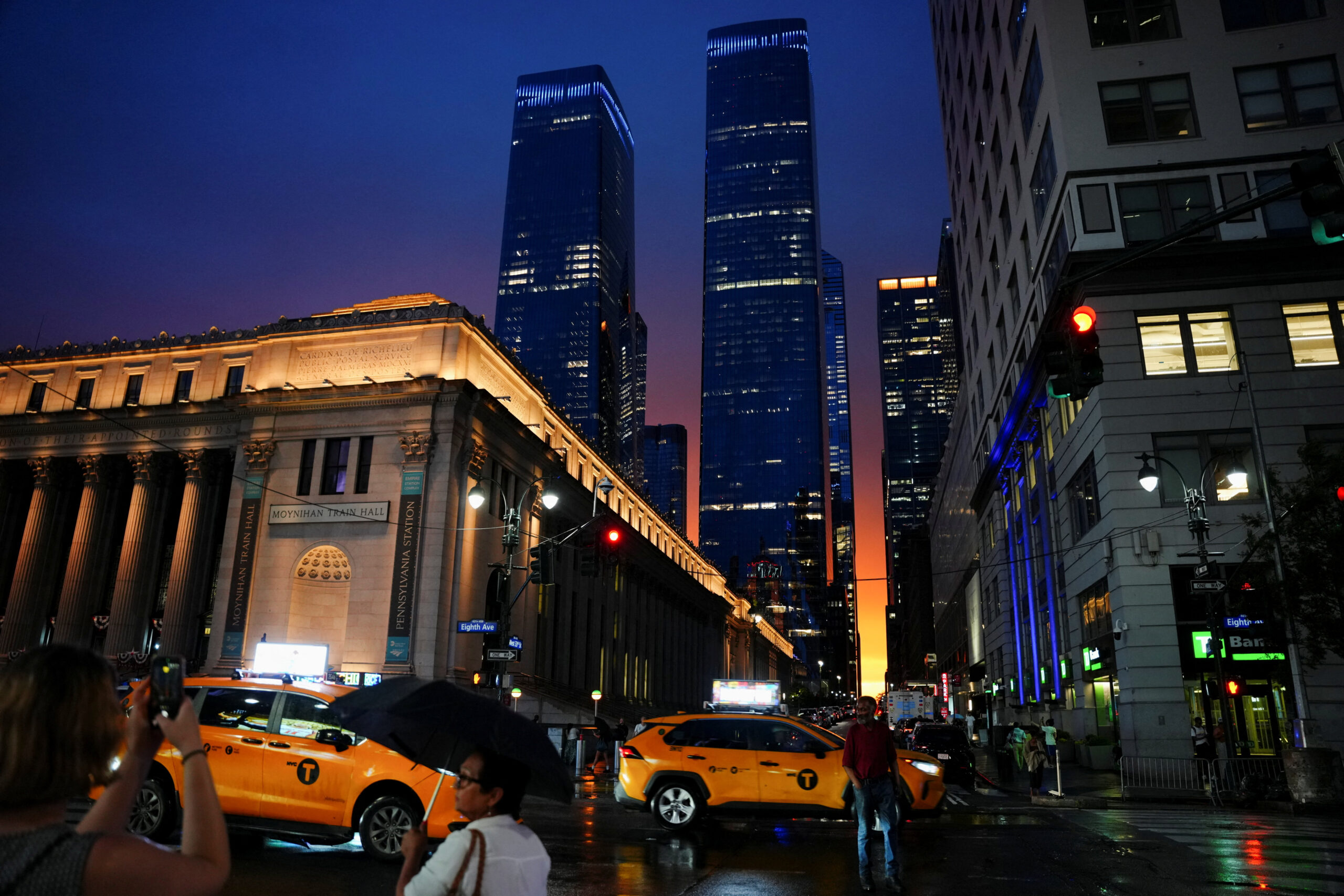 Traffic passes by as the sun sets near Madison Square Garden, the venue for the wedding celebrations of singer Taylor Swift and National Football League (NFL) player Travis Kelce, in New York, U.S., July 3, 2026. REUTERS