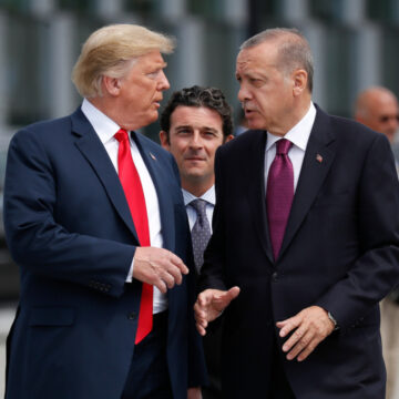 FILE - President Donald Trump, left, talks with Turkey's President Recep Tayyip Erdogan at a summit of heads of state and government at NATO headquarters in Brussels, July 11, 2018.