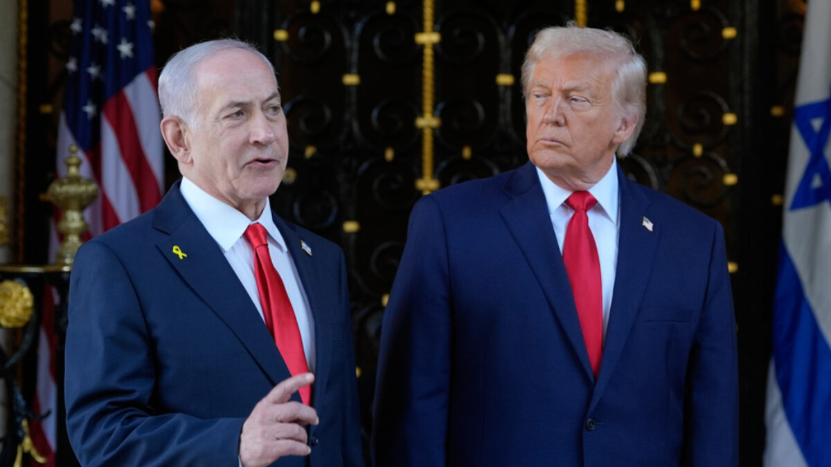 FILE - President Donald Trump listens as Israel's Prime Minister Benjamin Netanyahu speaks at President Donald Trump's Mar-a-Lago club, Dec. 29, 2025, in Palm Beach, Fla.