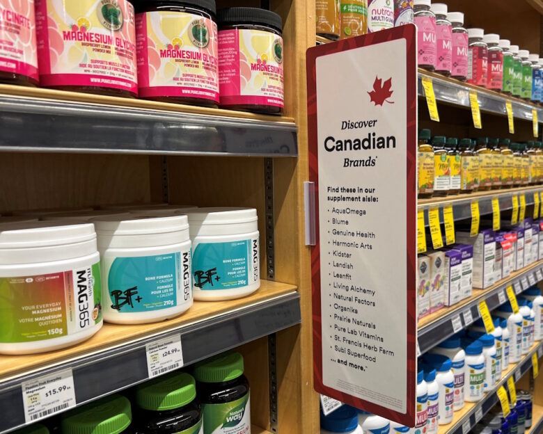 A sign invites customers to choose Canadian products in a health supplements aisle at a Whole Foods store in Vancouver, British Columbia, Canada July 20, 2026. Picture taken with a mobile phone.