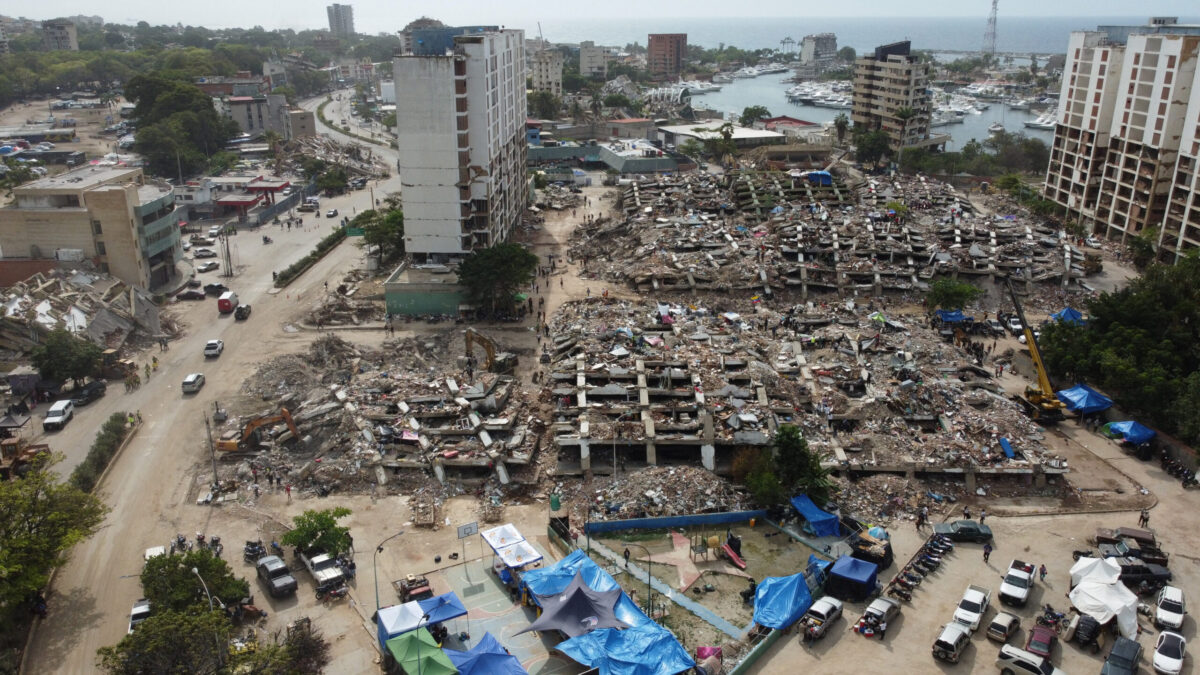 A drone view shows debris and the remains of a fallen building in the aftermath of the June 24 earthquakes in Tanaguarena, La Guaira, Venezuela, July 12, 2026. REUTERS