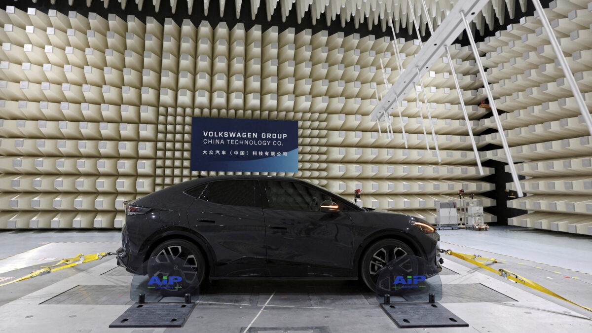 FILE PHOTO: A Volkswagen electric vehicle (EV) is set up for a test performed as a media demonstration, at the carmaker's electromagnetic compatibility laboratory in Hefei, Anhui province, China.