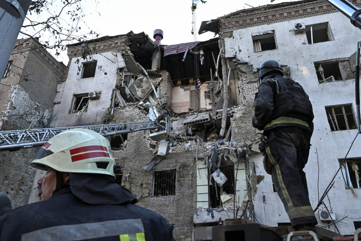 Rescuers work at the site of an apartment building which was hit by a Russian air strike, amid Russia’s attack on Ukraine, in Zaporizhzhia, Ukraine, July 19, 2026. REUTERS/Stringer