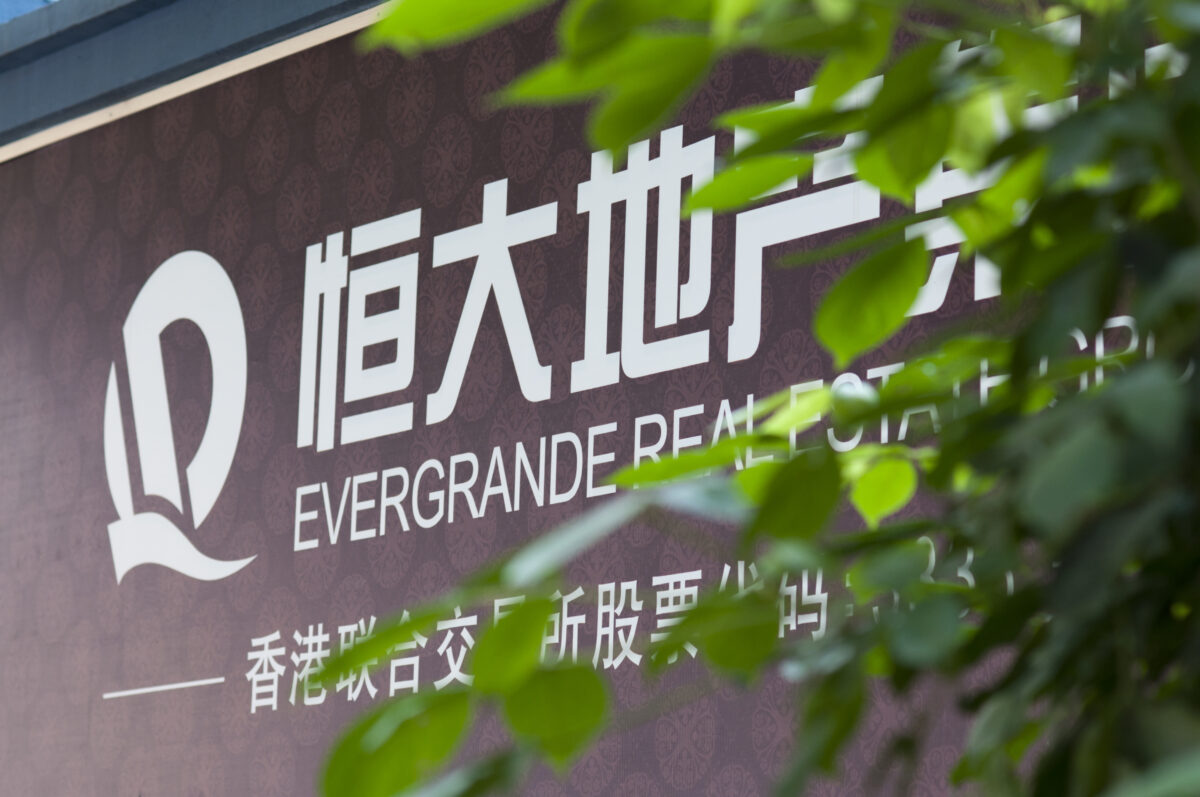 --FILE--View of an advertisement of Evergrande Real Estate Group in Guangzhou city, south China's Guangdong province, 3 May 2015. China Evergrande Group, the country's second-largest property developer by sales, said on Monday (20 August 2018) the board proposed a dividend of 1.13 yuan, or HK$1.287, per share for the two financial years of 2016 and 2017. Evergrande shares closed 4.5 percent higher at HK$28 on Monday. The stock gained 30 percent in the past month.